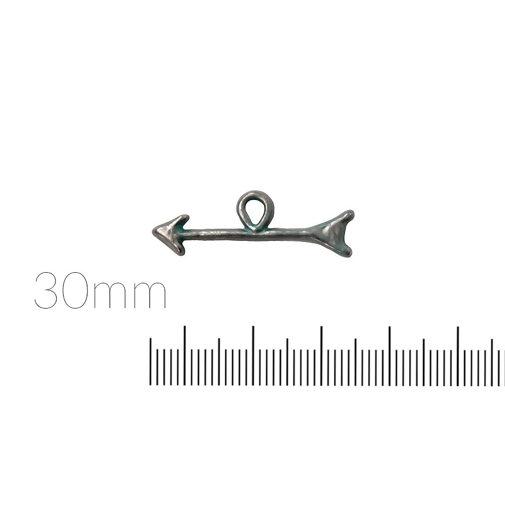 alt="artisan verdigris arrow charm"