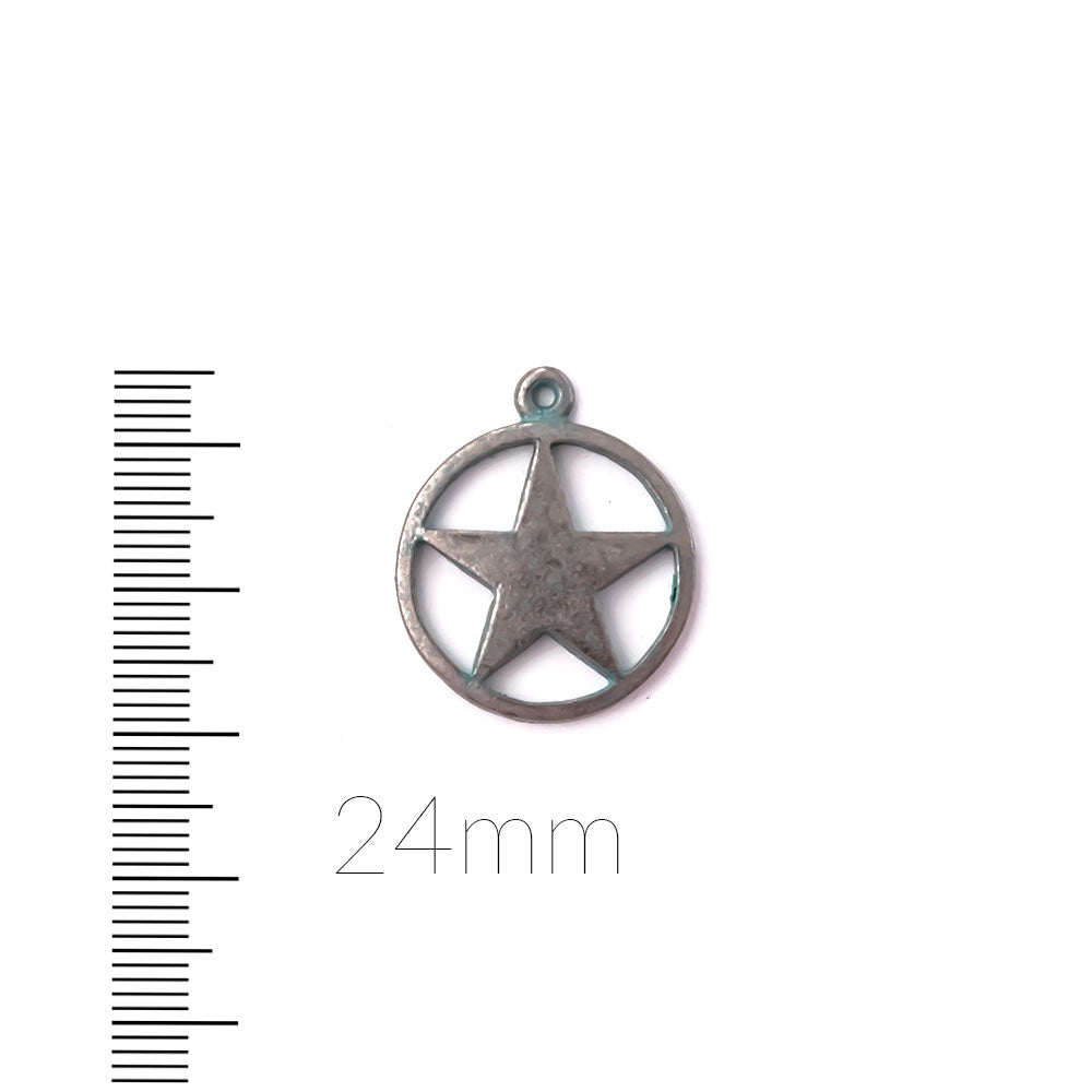 alt="artisan verdigris circle of star charm"