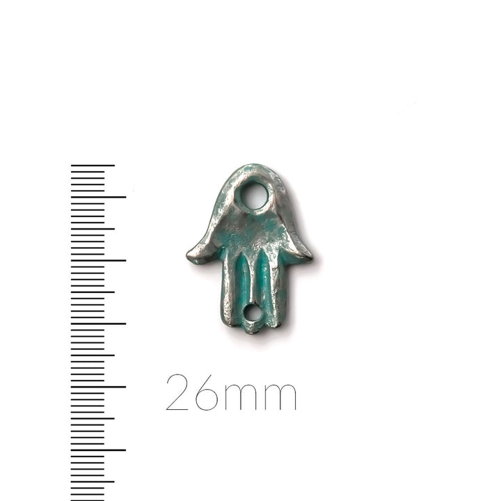 alt="artisan verdigris hamsa palm"