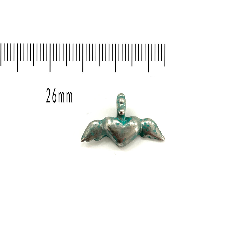 alt="artisan verdigris winged heart charm"