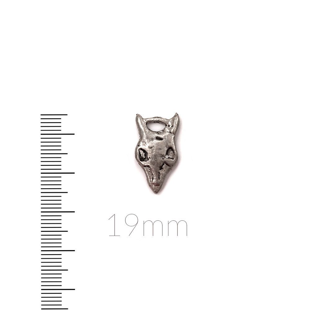 alt="antique pewter animal skull charm"