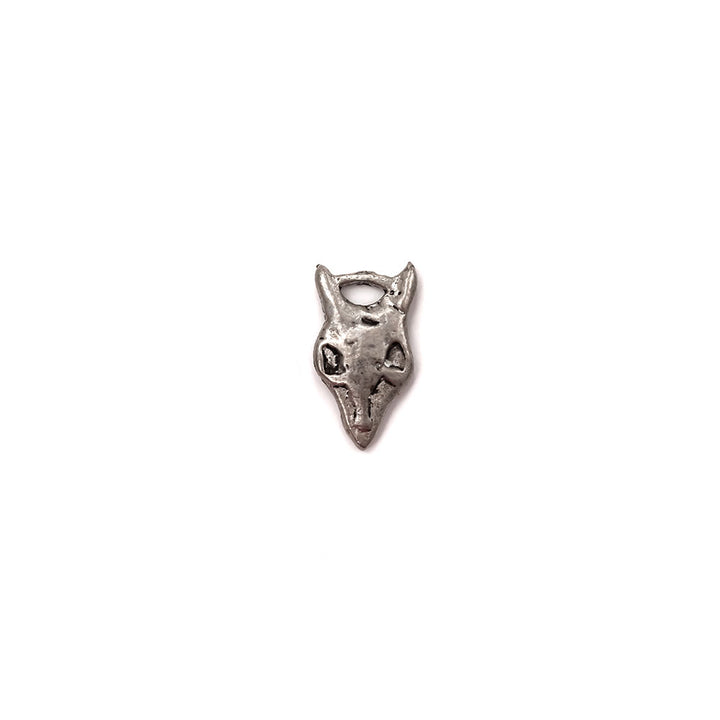 alt="antique pewter animal skull charm"