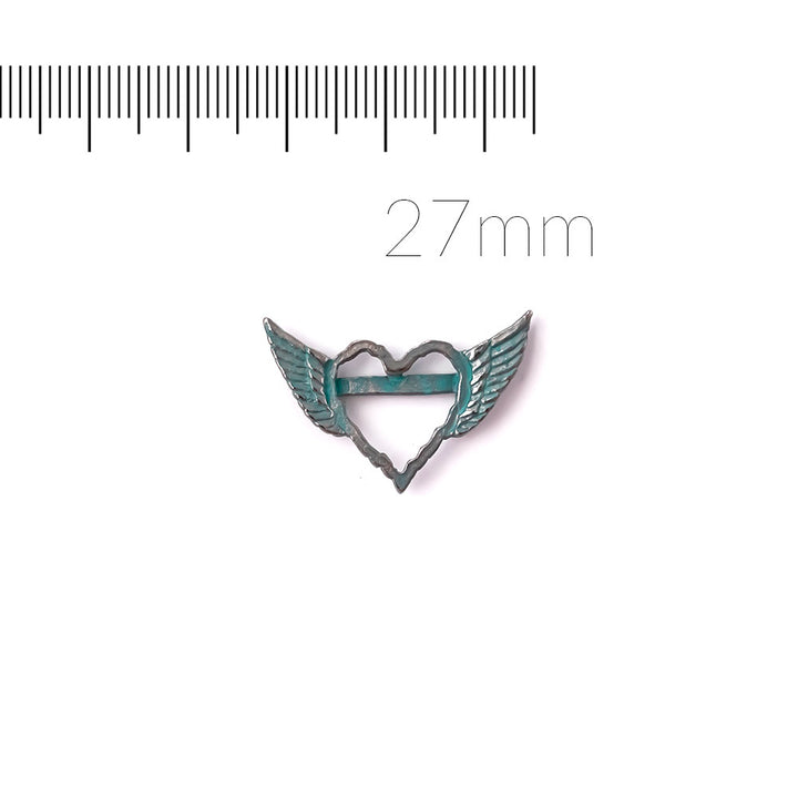 alt="artisan verdigris winged heart connector"